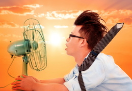 man-in-front-of-fan