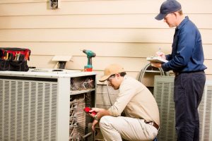 technicians-with-air-conditioner