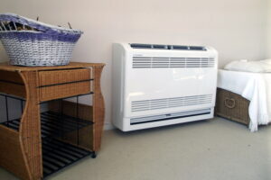 Heat pump unit visible in a bedroom.