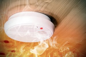 smoke-curling-around-a-smoke-detector
