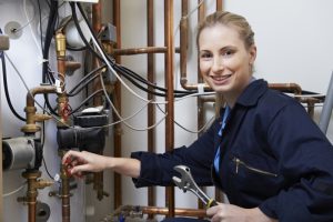 technician-repairing-boiler